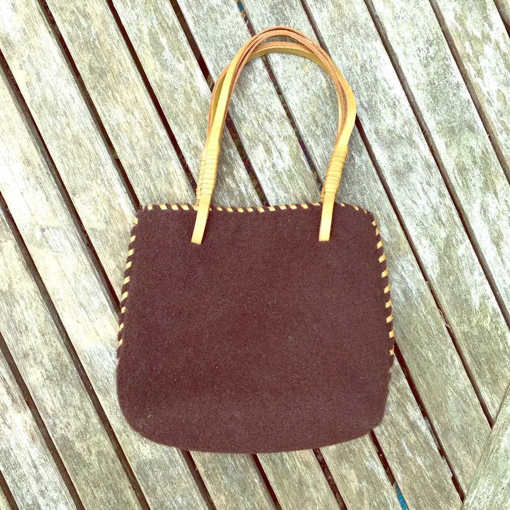 Brown felt bag with leather straps